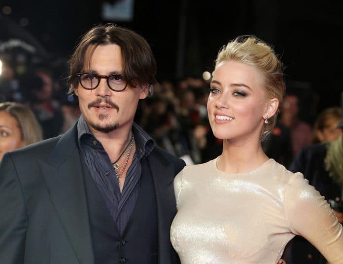 Johnny Depp e Amber Heard sul red carpet